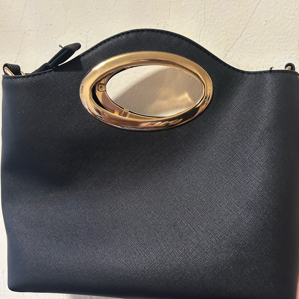 Elegant Black Handbag with Gold Accents